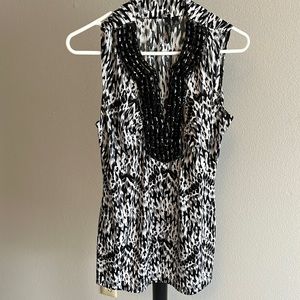 Polyester, 5 %spandex, beading on neckline